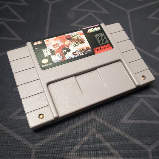 Image shows the front of the cartridge for the video game NFL Quarterback Club 96 for the Super Nintendo