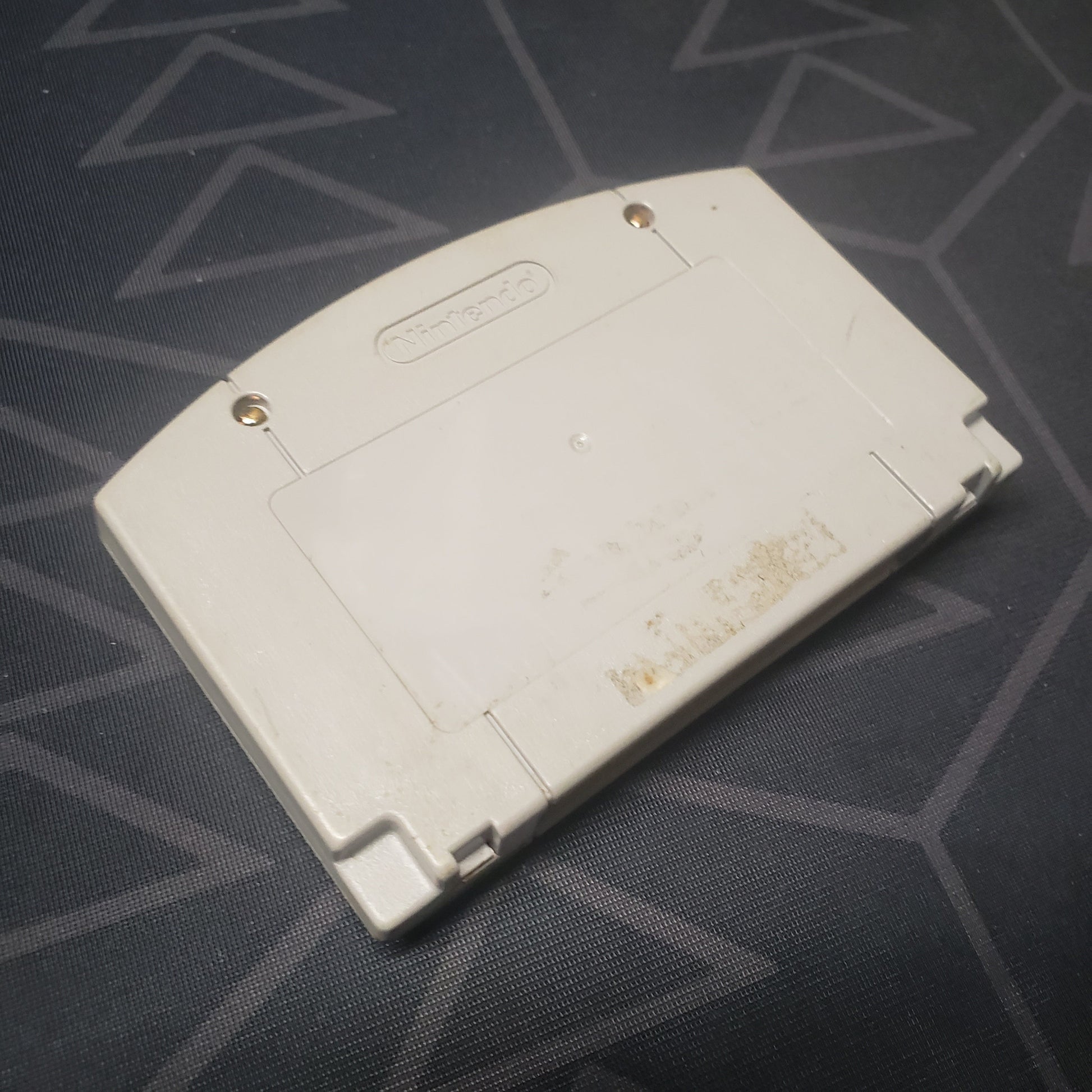 Image shows the back of the cartridge for the video game NFL Quarterback Club 98 for the Nintendo 64