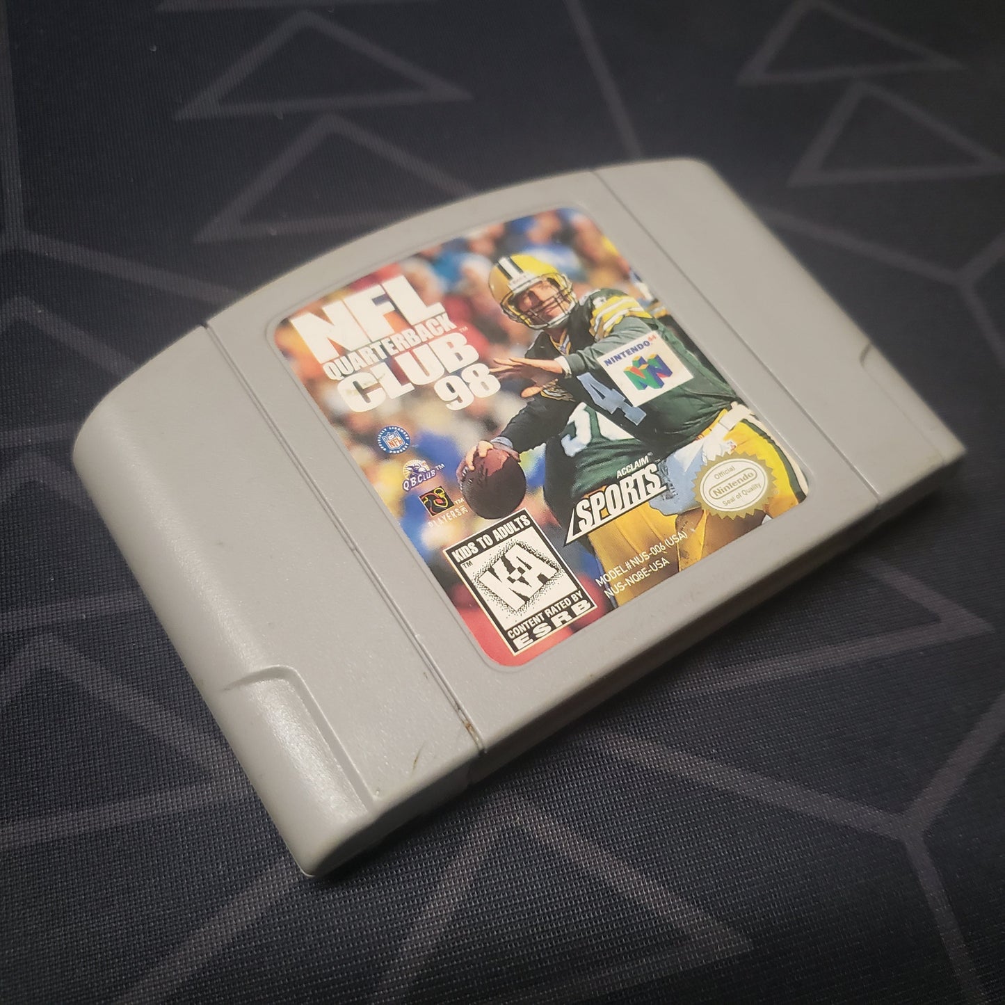 Image shows the front of the cartridge for the video game NFL Quarterback Club 98 for the Nintendo 64