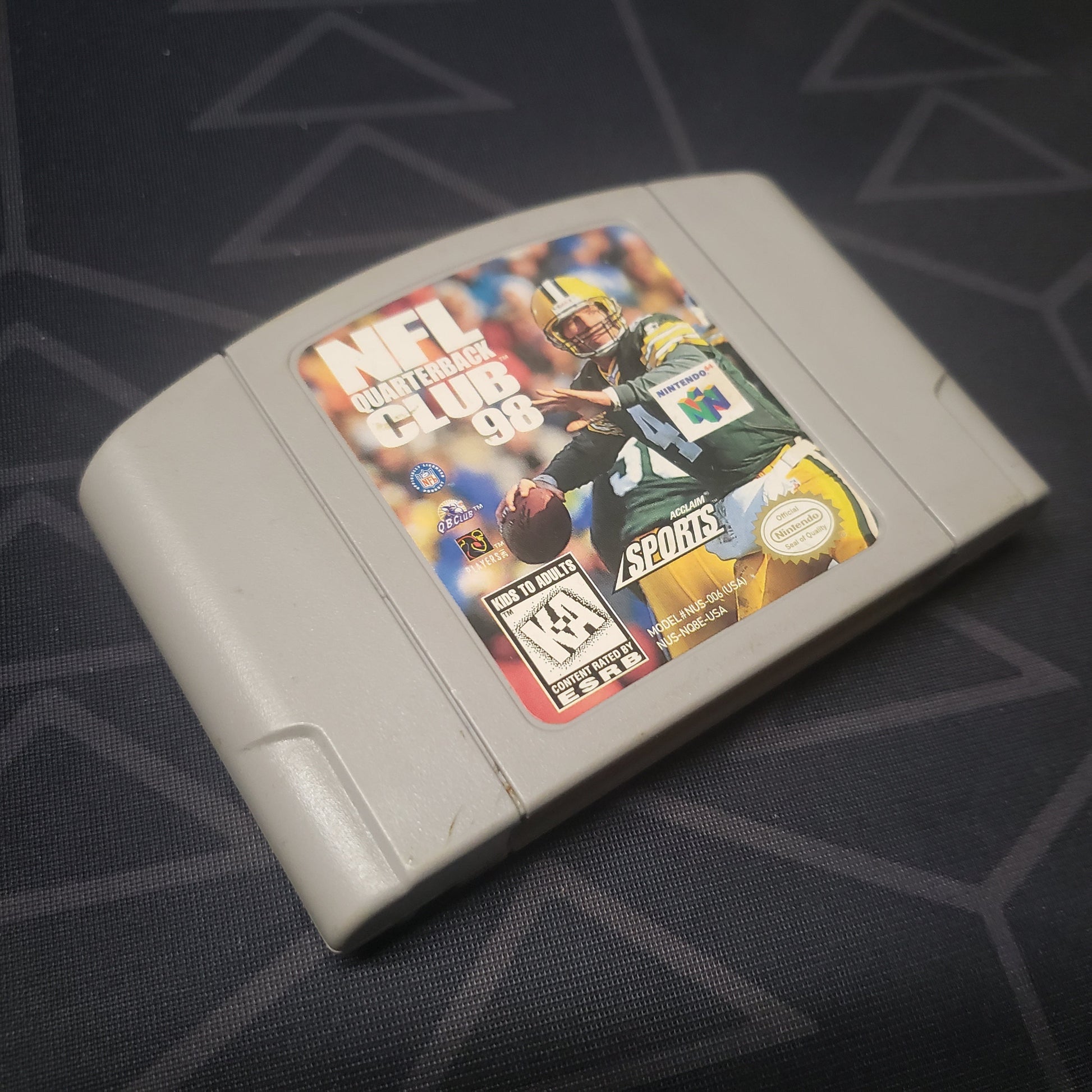 Image shows the front of the cartridge for the video game NFL Quarterback Club 98 for the Nintendo 64