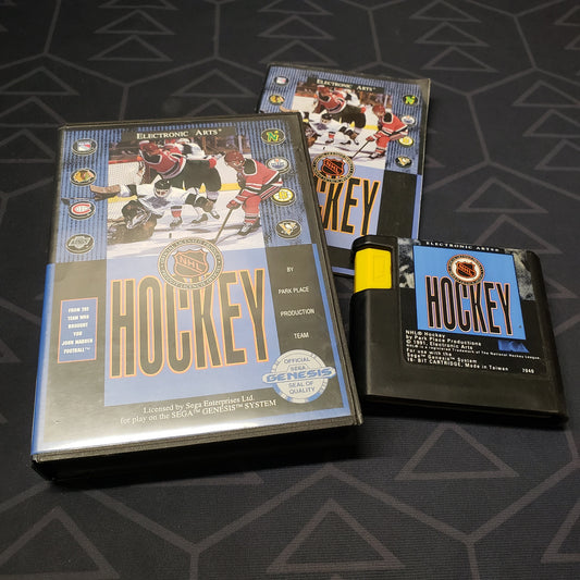 Image shows the case, manual and cartridge for the video game NHL Hockey for Sega Genesis