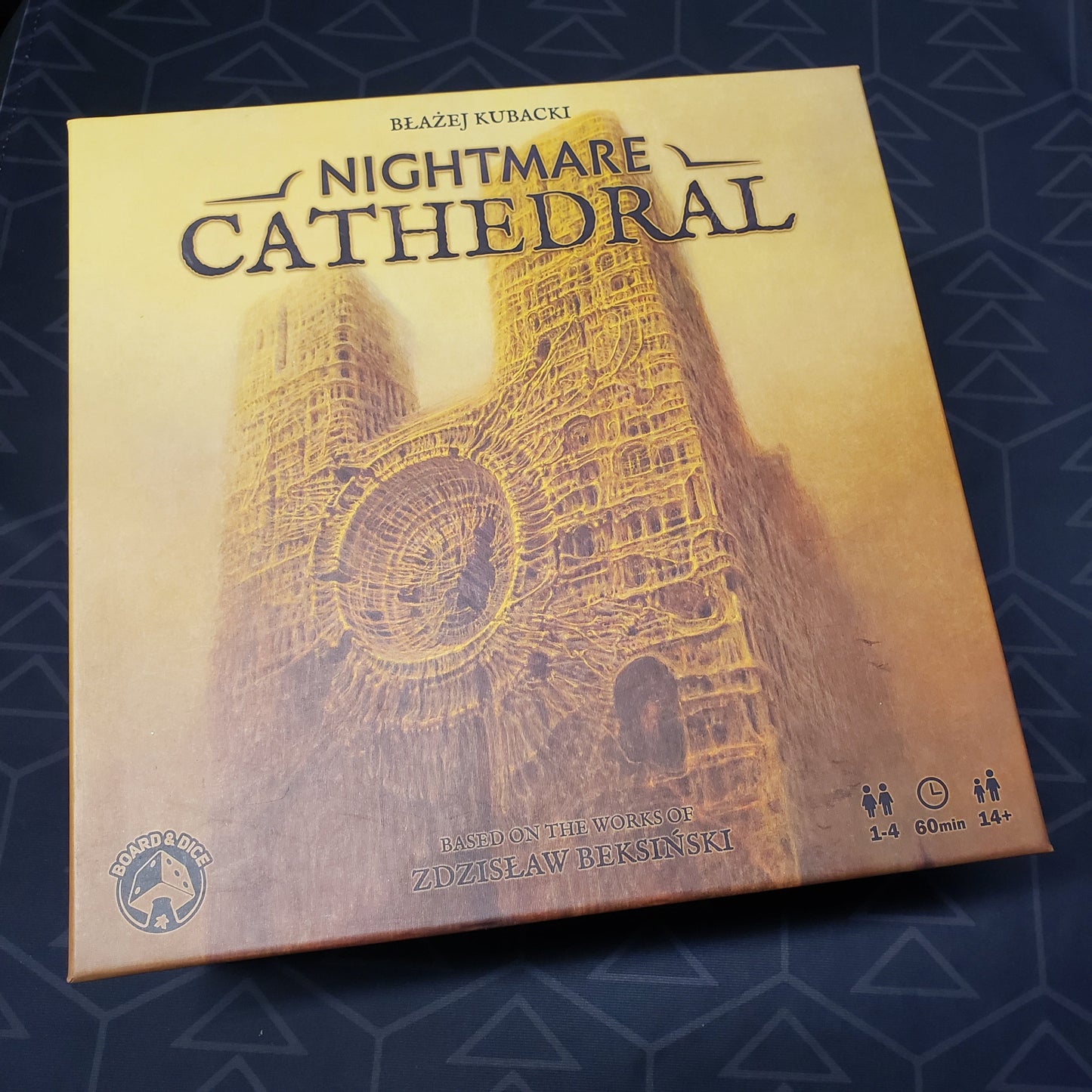 Image shows the front cover of the box for the Nightmare Cathedral board game