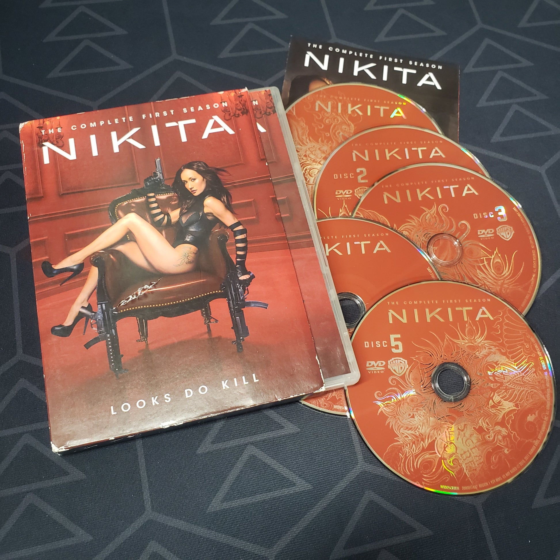 Image shows the case, outer box, insert & five discs for the first season of Nikita on DVD