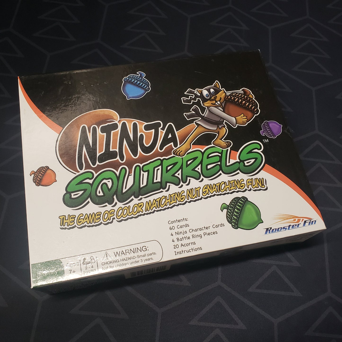 Image shows the front cover of the box for the Ninja Squirrels card game