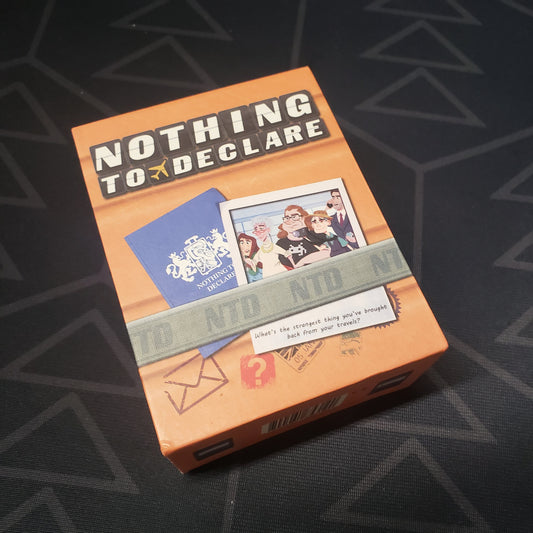 Image shows the front cover of the box of the Nothing to Declare card game