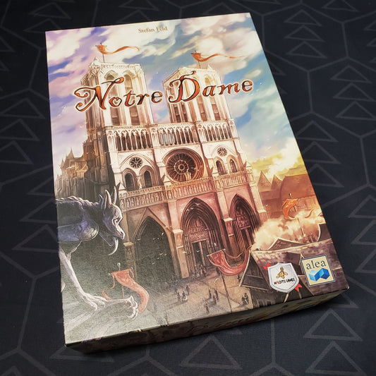 Image shows the front cover of the box for the Notre Dame board game