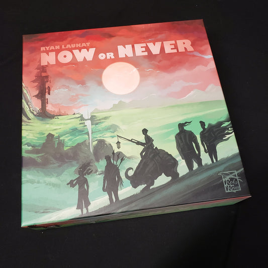 Image shows the front cover of the box of the Now or Never board game