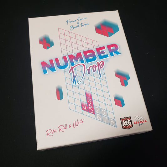 Image shows the front cover of the box of the Number Drop board game
