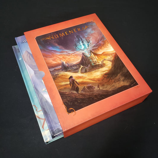 Image shows the front cover of the deluxe slipcover set of Discovery & Destiny books for the roleplaying game Numenera