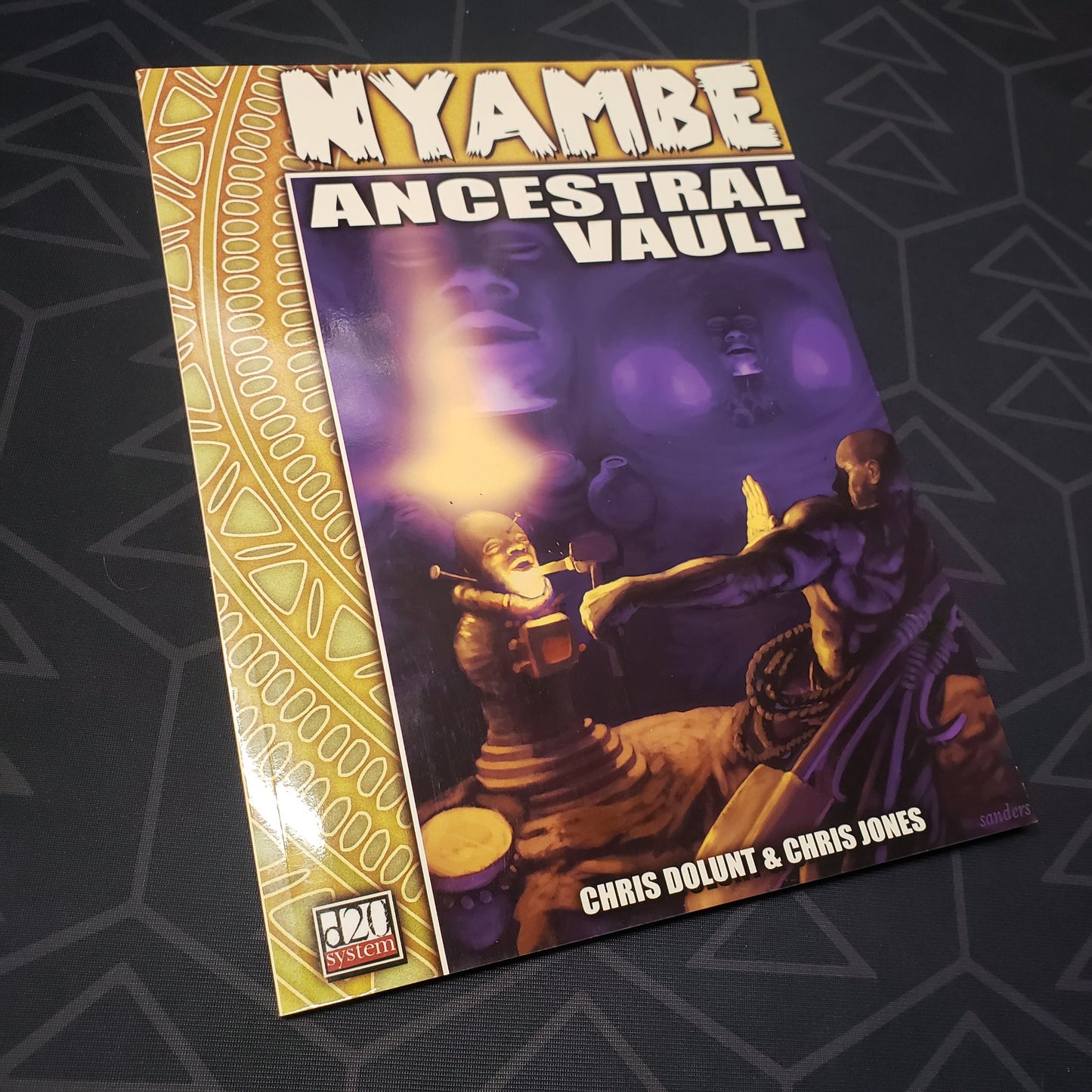 Image shows the front cover of the Nyambe: Ancestral Vault roleplaying game book