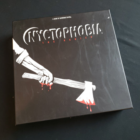 Image shows the front cover of the box of the Nyctophobia: The Hunted board game
