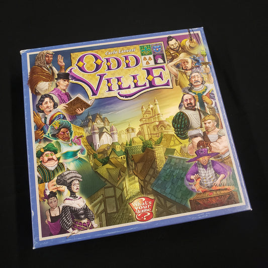 Image shows the front cover of the box of the Oddville card game
