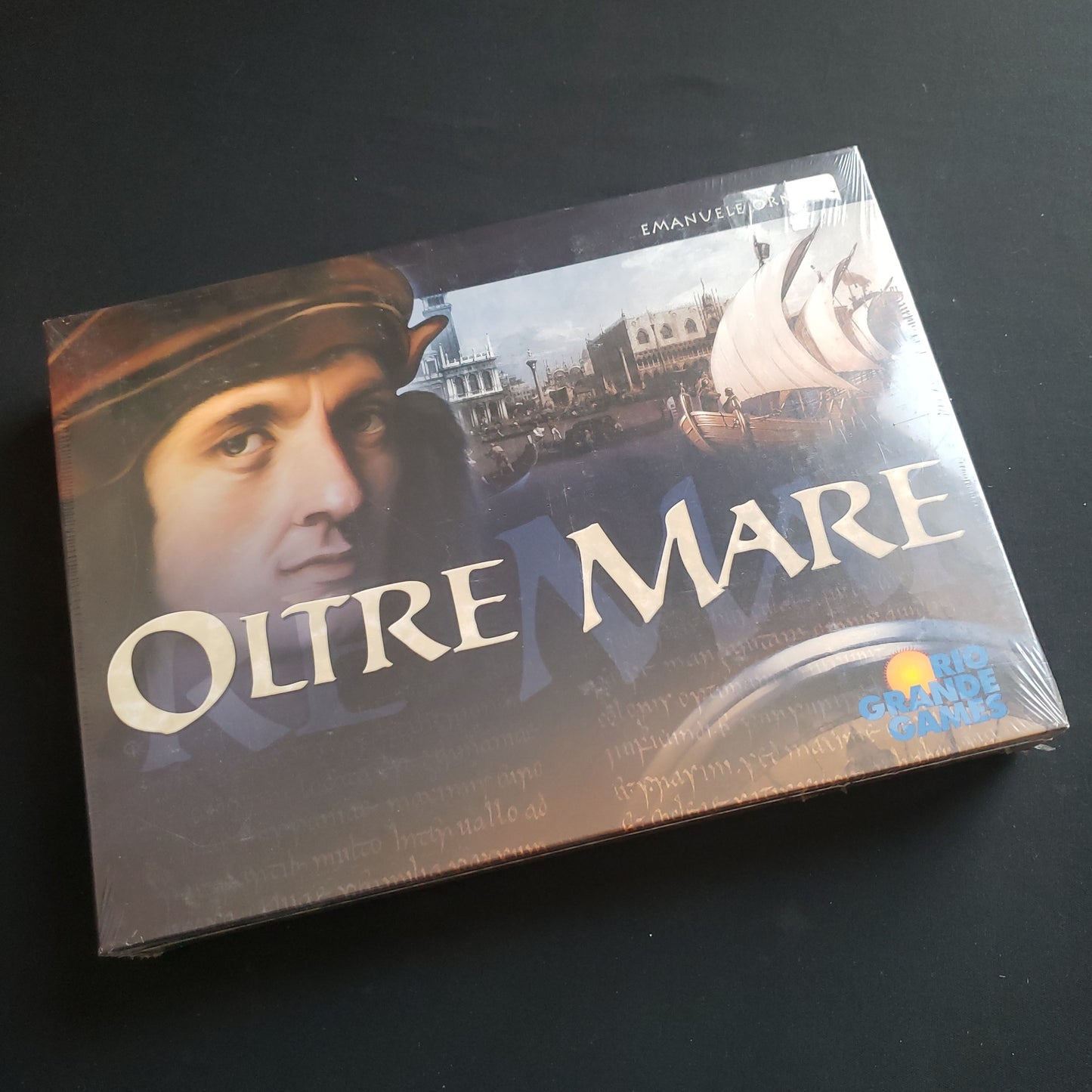 Image shows the front cover of the box of the Oltre Mare board game