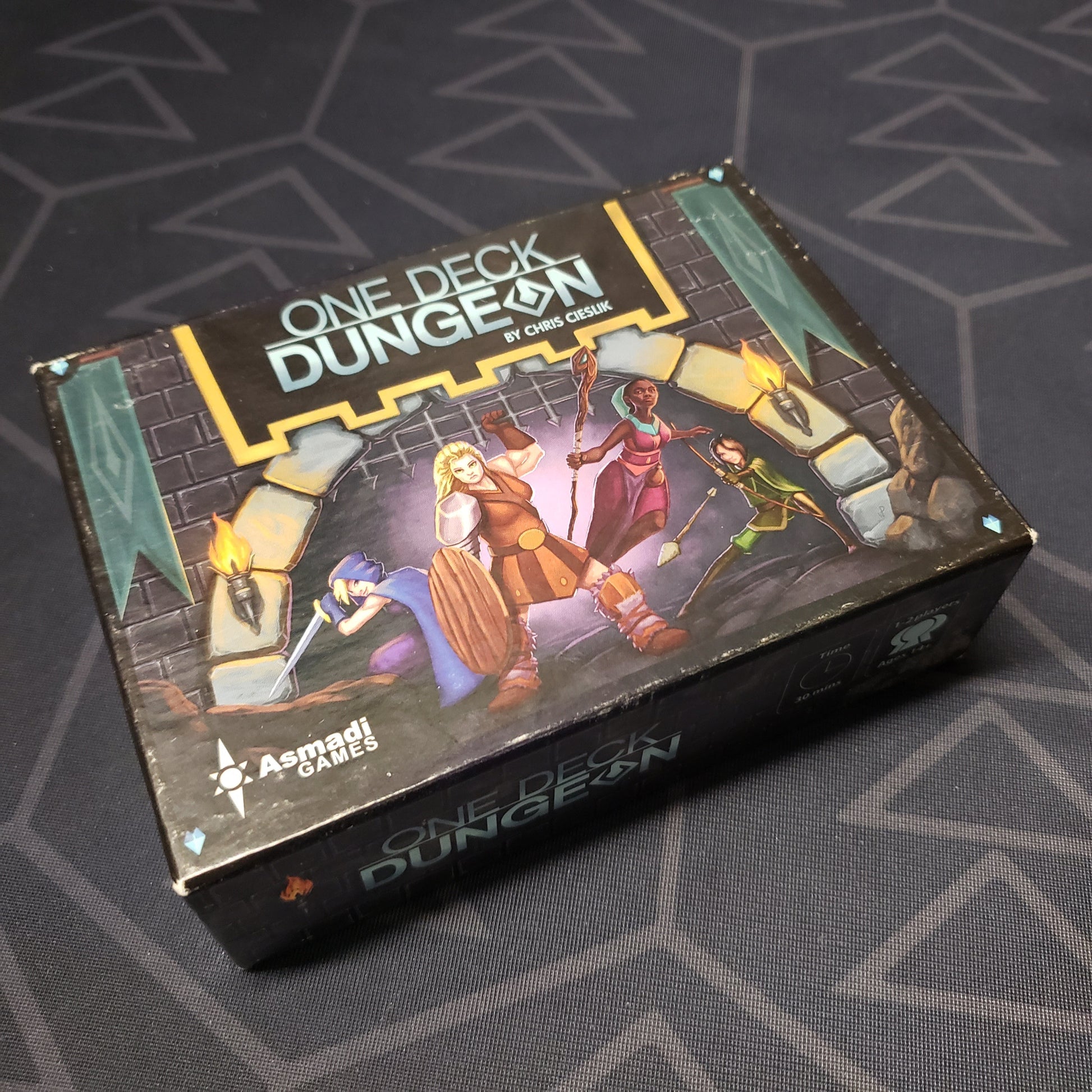Image shows the front cover of the box of the One Deck Dungeon card game