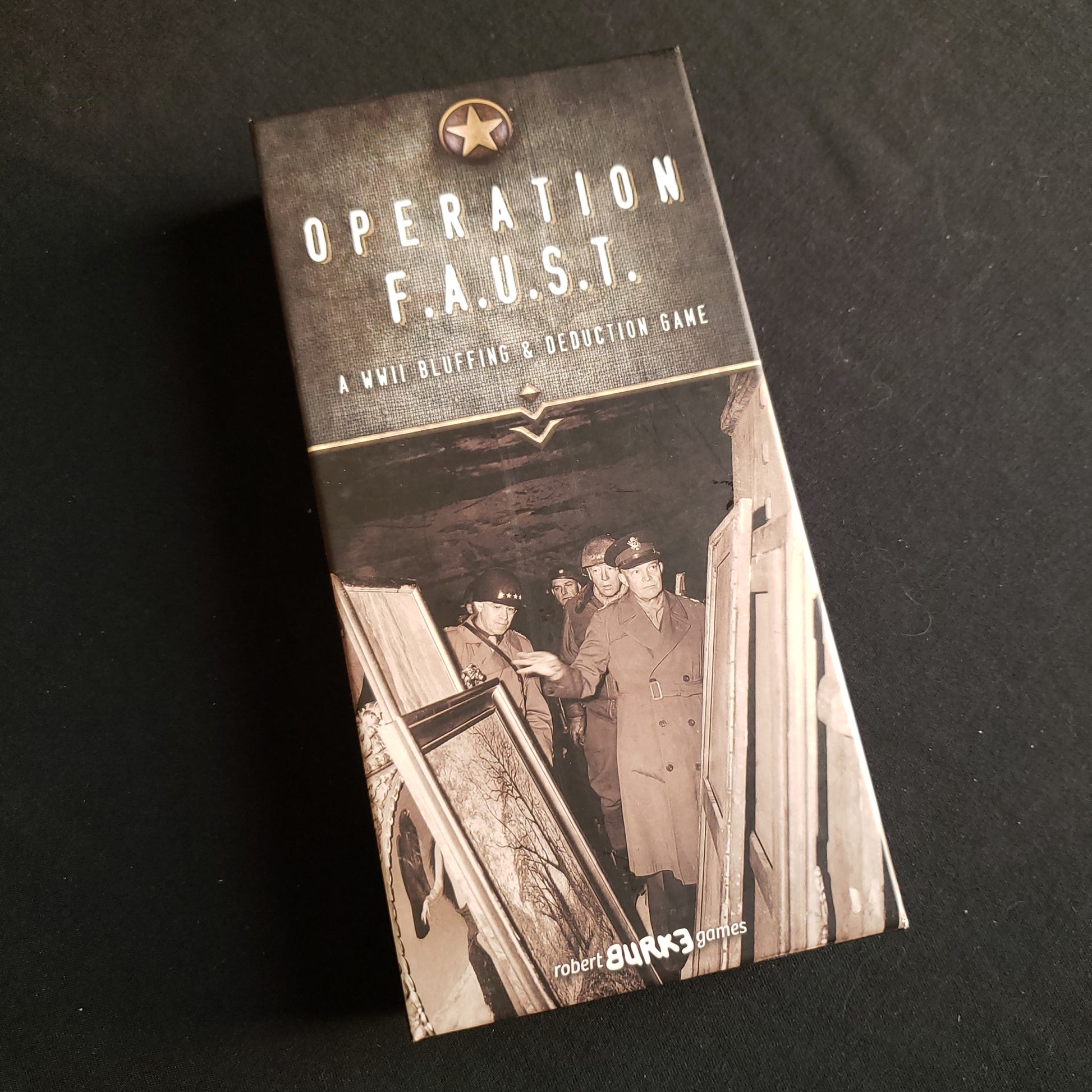 Image shows the front cover of the box of the Operation F.A.U.S.T. card game