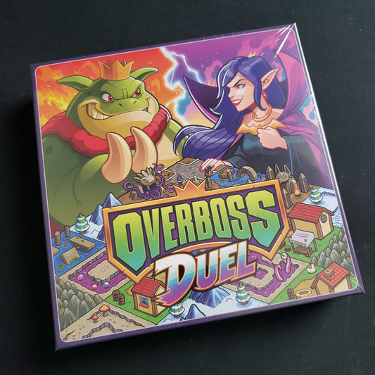 Image shows the front cover of the box for the Overboss Duel board game
