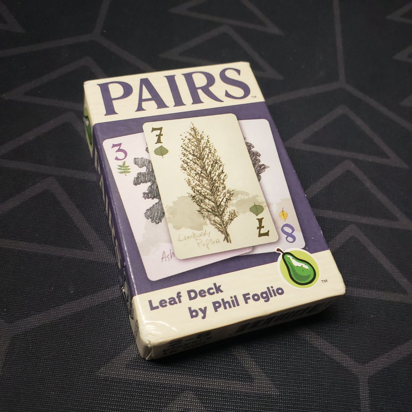 Image shows the front cover of the Leaf Deck box for the Pairs card game