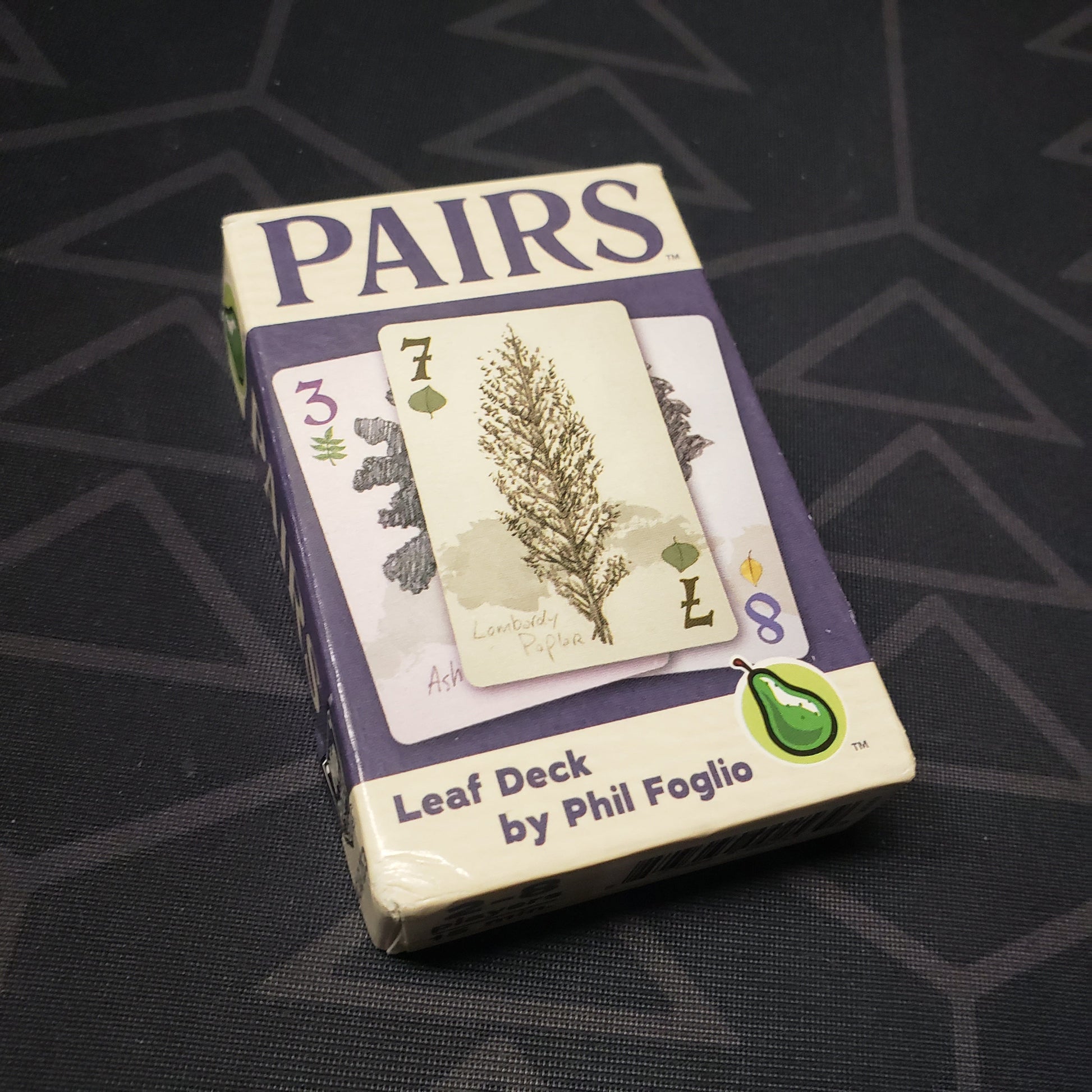 Image shows the front cover of the Leaf Deck box for the Pairs card game