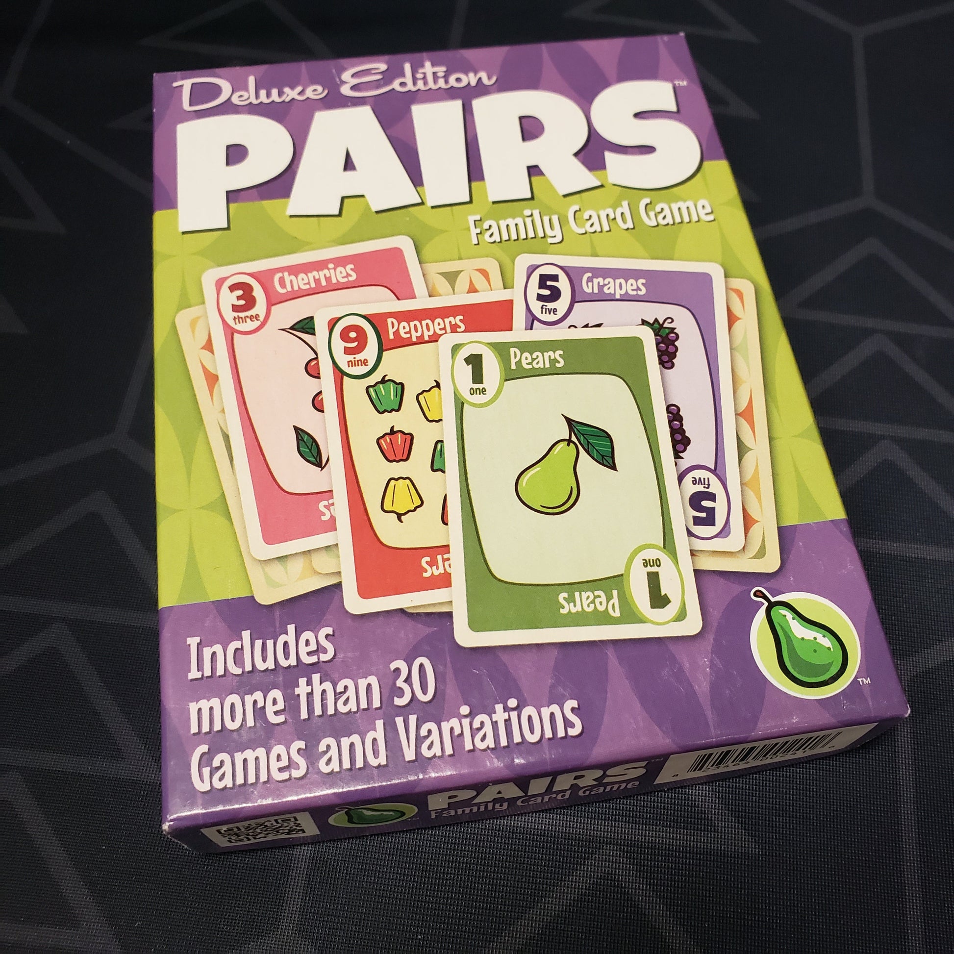 Image shows the front cover of the box of the Pairs (Deluxe Edition) card game