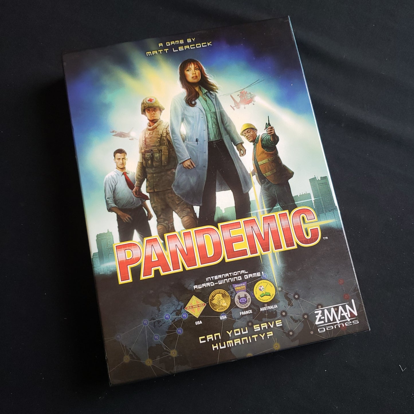 Image shows the front cover of the box of the Pandemic board game