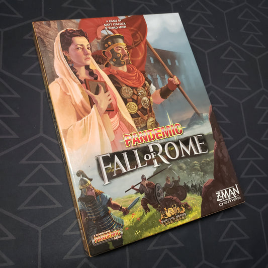 Image shows the front cover of the box for the Pandemic: Fall of Rome board game