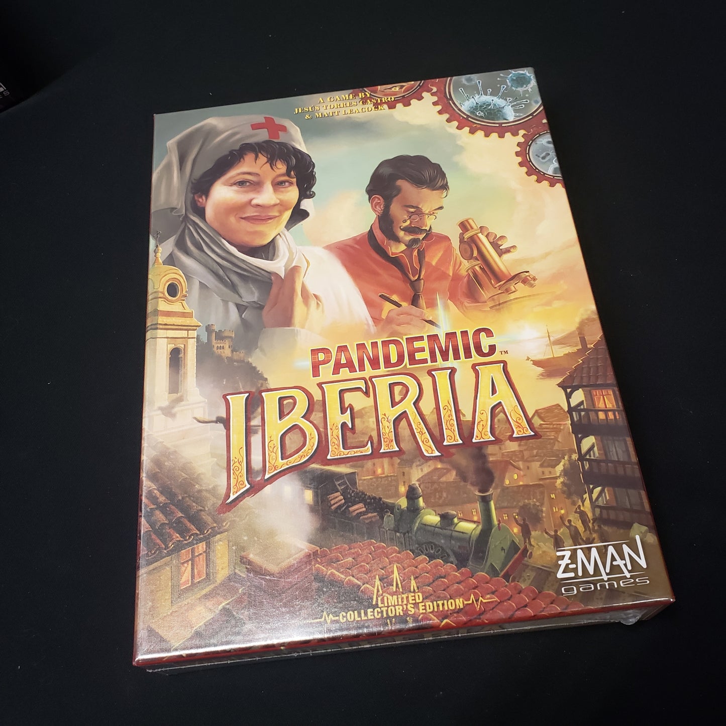 Image shows the front cover of the box of the Pandemic: Iberia board game