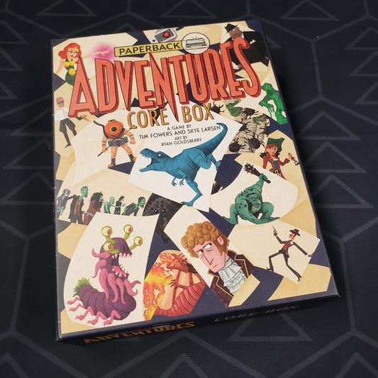 Image shows the front of the box for the core box for the card game Paperback Adventures