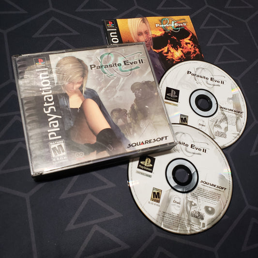 Image shows the jewel case, manual and two discs for the video game Parasite Eve II for Playstation 1
