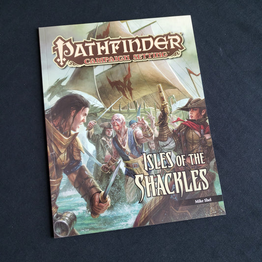 Image shows the front cover of the Isles of the Shackles book for the Pathfinder 1E roleplaying game
