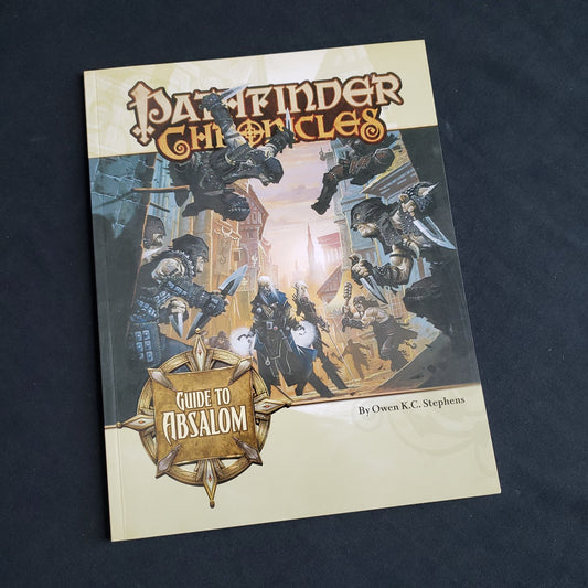 Image shows the front cover of the Guide to Absalom book for the Pathfinder 1E roleplaying game