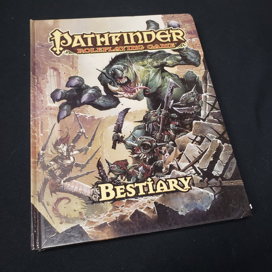 Image shows the front cover of the Bestiary book for the roleplaying game Pathfinder 1E