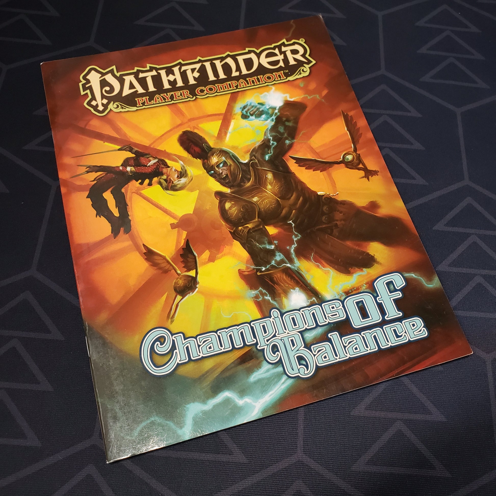 Image shows the front cover of the Champions of Balance book for the roleplaying game Pathfinder: First Edition