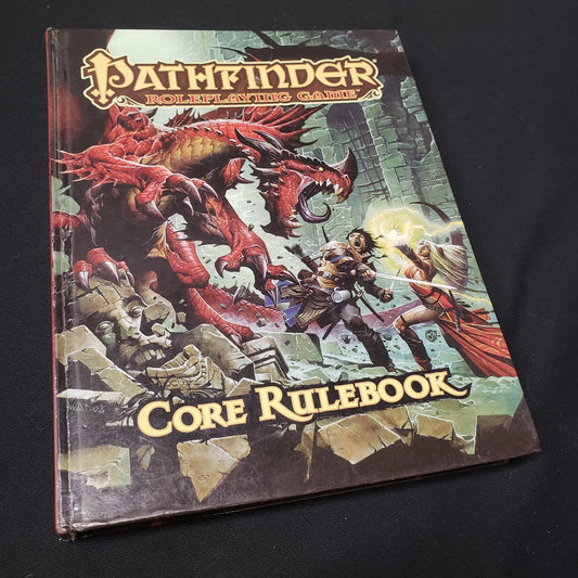 Image shows the front cover of the core rulebook for the roleplaying game Pathfinder 1E