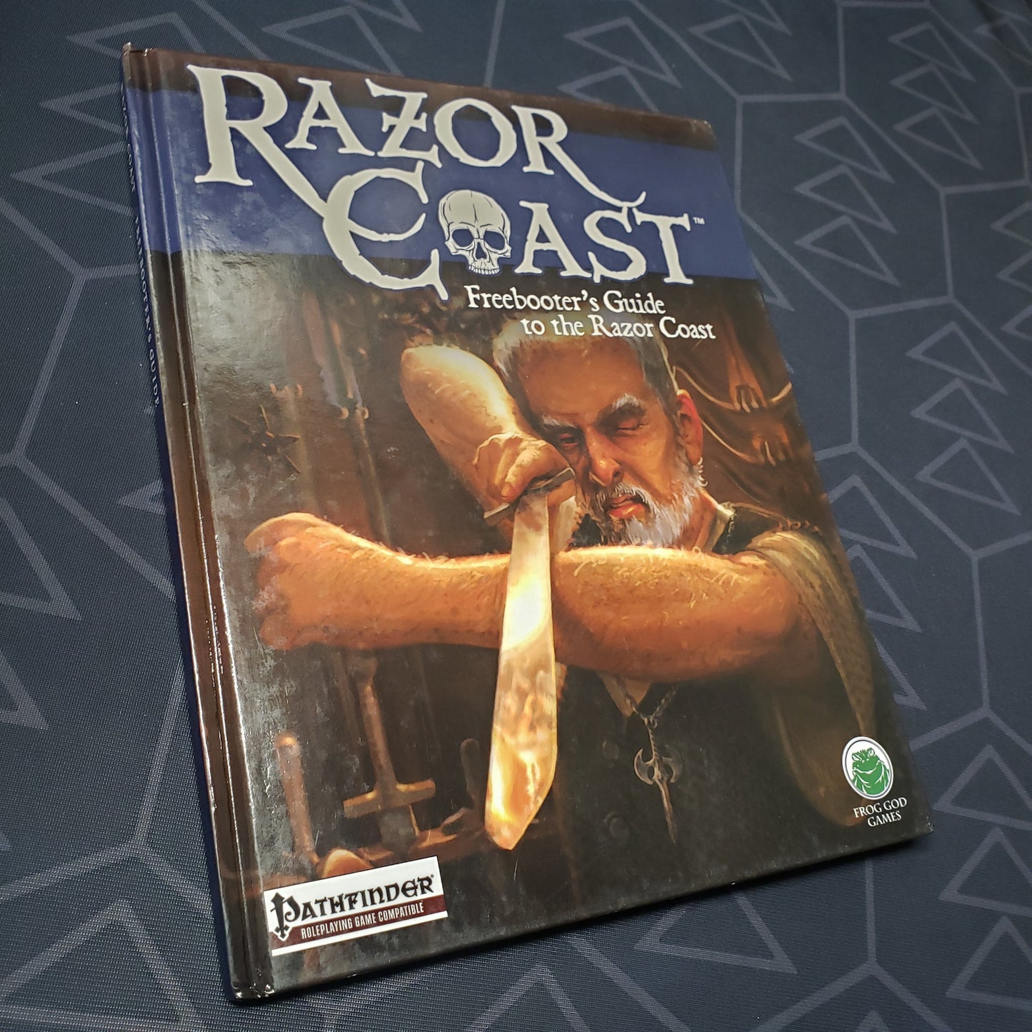Image shows the front cover of the Freebooter's Guide to the Razor Coast book for the roleplaying game Pathfinder 1E