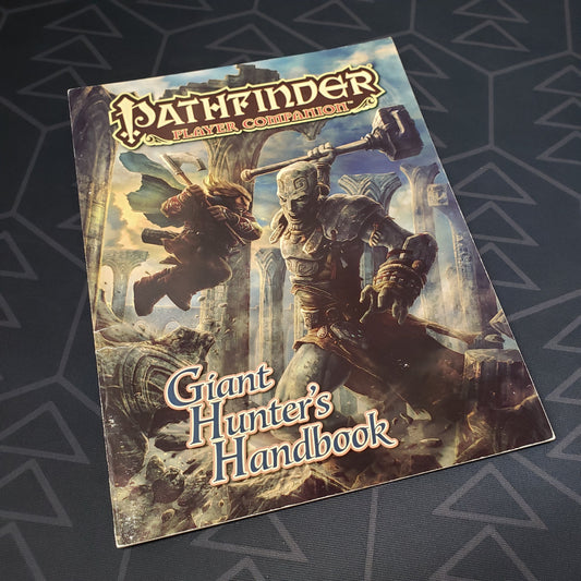 Image shows the front cover of the Giant Hunter's Handbook book for the roleplaying game Pathfinder: First Edition