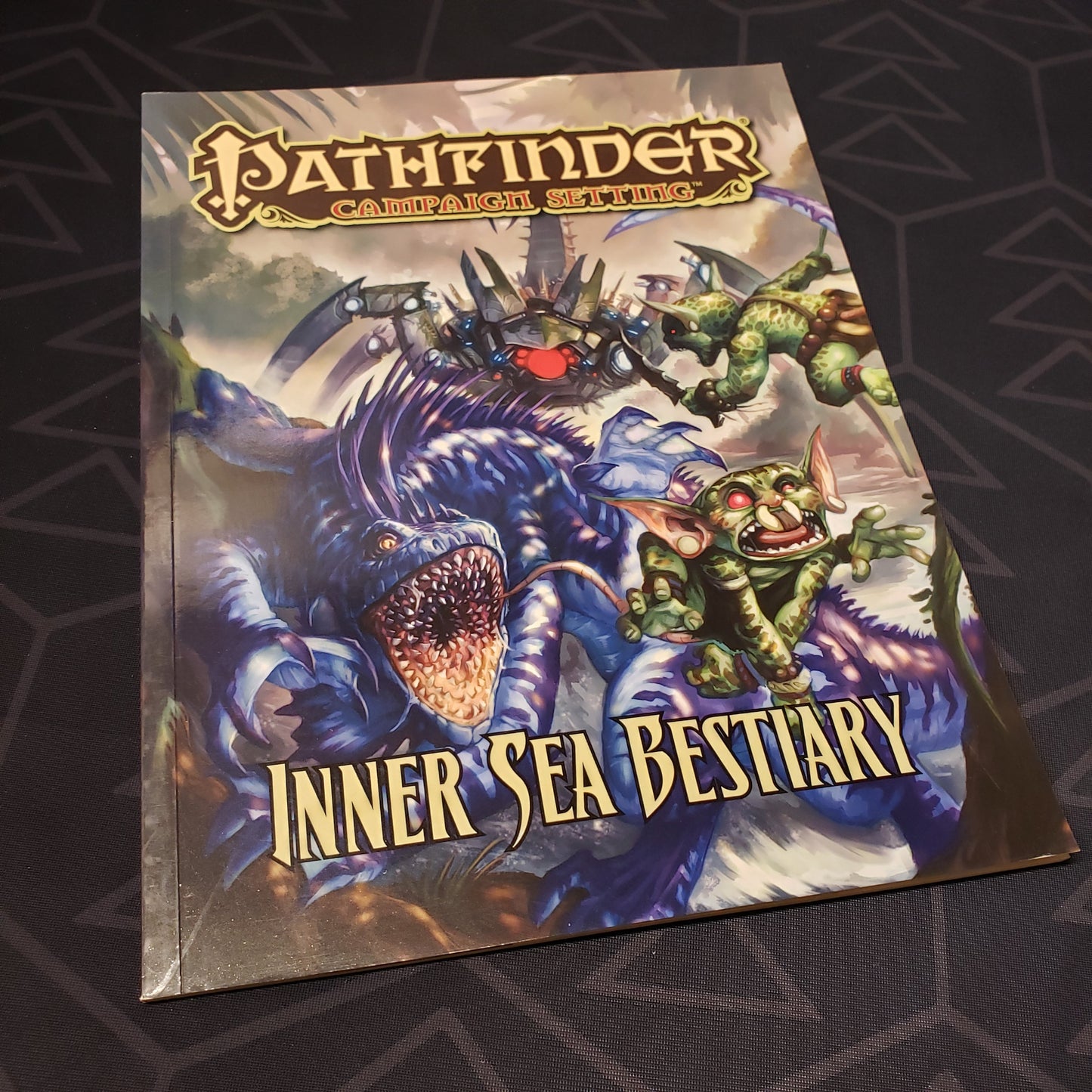 Image shows the front cover of the Inner Sea Bestiary book for the roleplaying game Pathfinder 1E