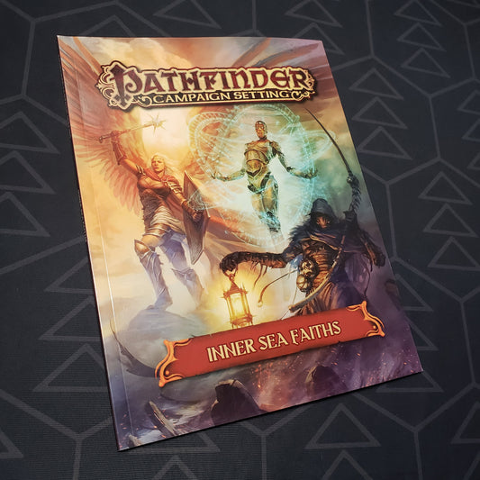 Image shows the front cover of the Inner Sea Faiths book for the roleplaying game Pathfinder 1E