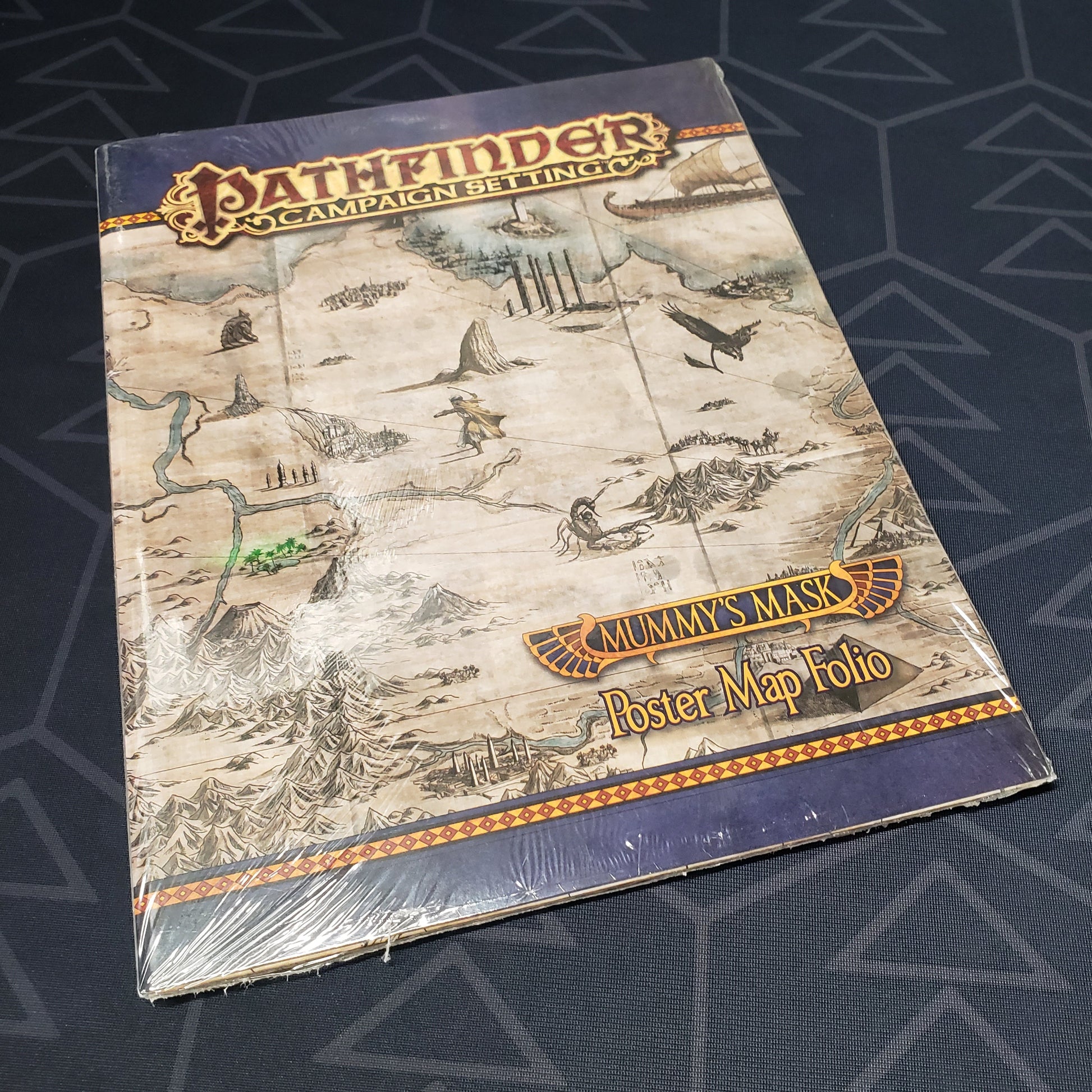 Image shows the front cover of the Mummy's Mask Poster Map Folio for the roleplaying game Pathfinder First Edition