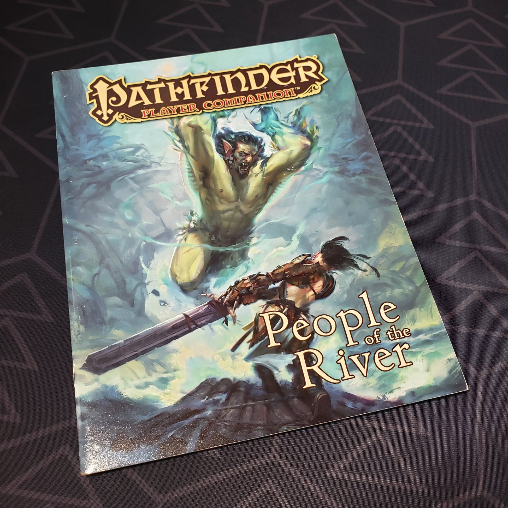 Image shows the front cover of the People of the River book for the roleplaying game Pathfinder: First Edition