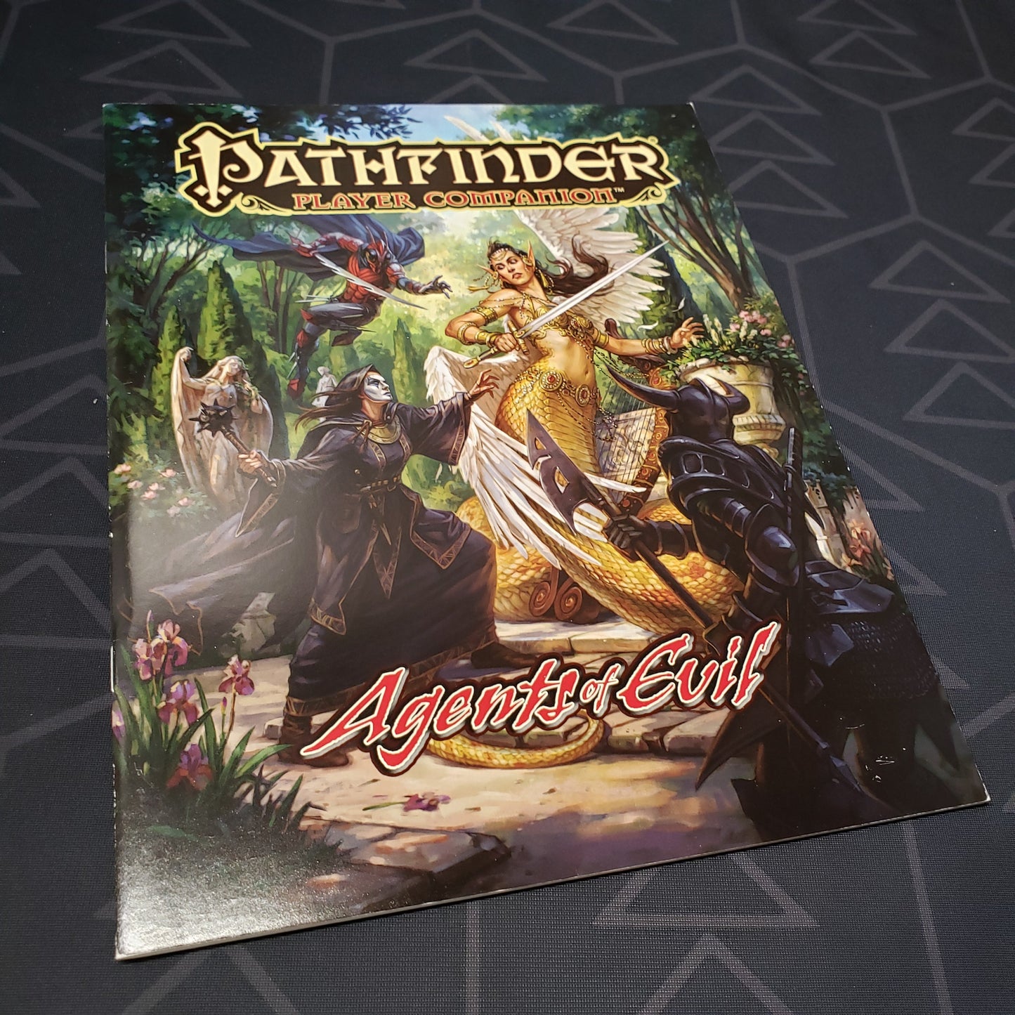 Image shows the front cover of the Player Companion: Agents of Evil book for the roleplaying game Pathfinder 1E