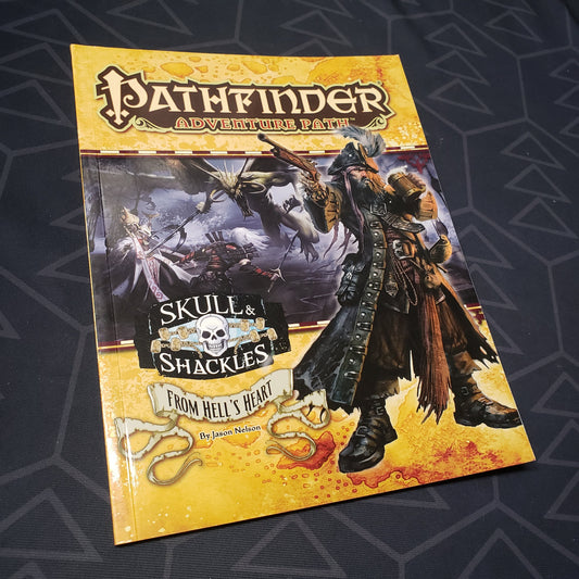 Image shows the front cover of the Skull & Shackles #6: From Hell's Heart book for the roleplaying game Pathfinder 1E