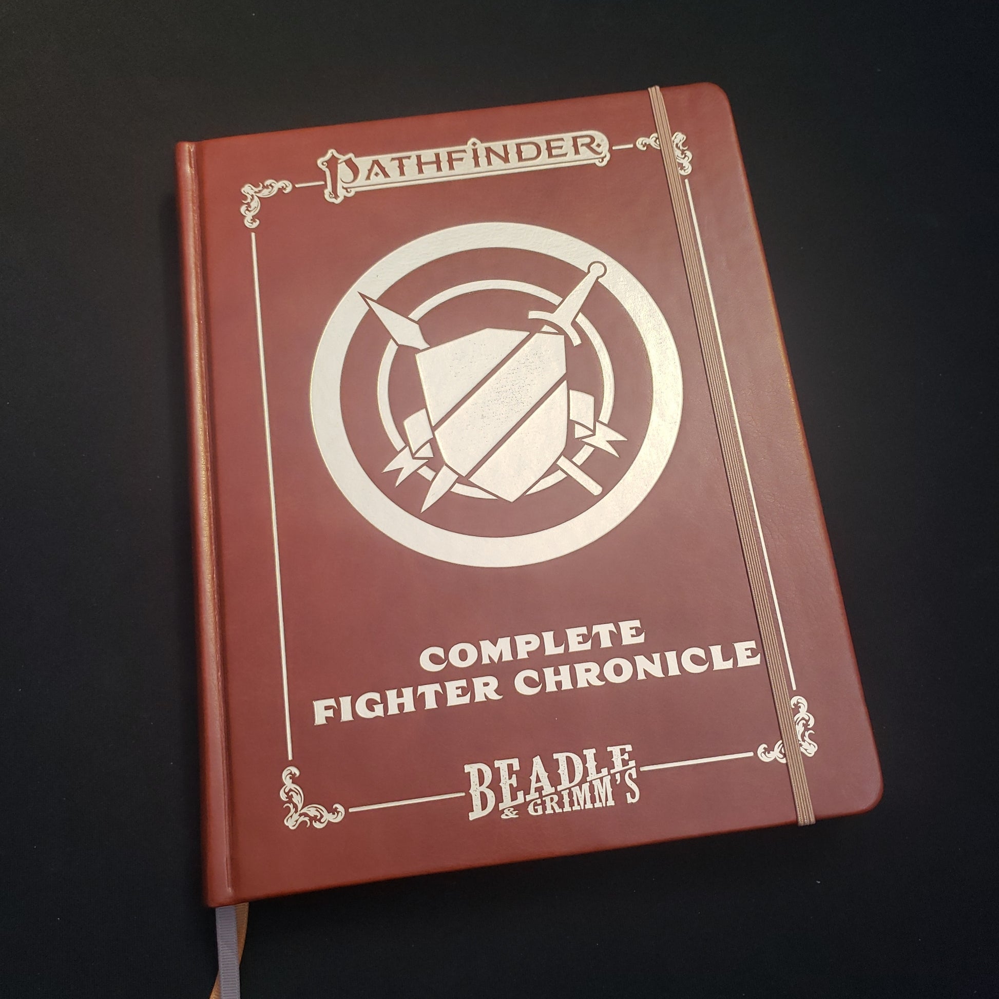Image shows the front cover of the Complete Fighter Chronicle book for the Pathfinder 2E roleplaying game