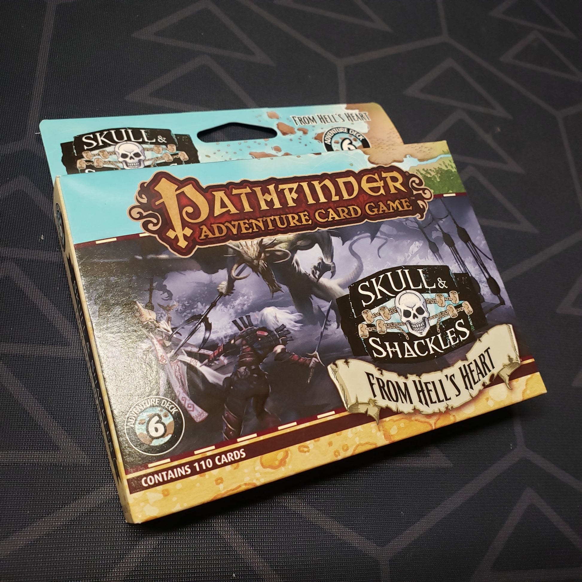 Image shows the front cover of the box of the Skull & Shackles Deck #6: From Hell's Heart expansion for the Pathfinder Adventure Card Game