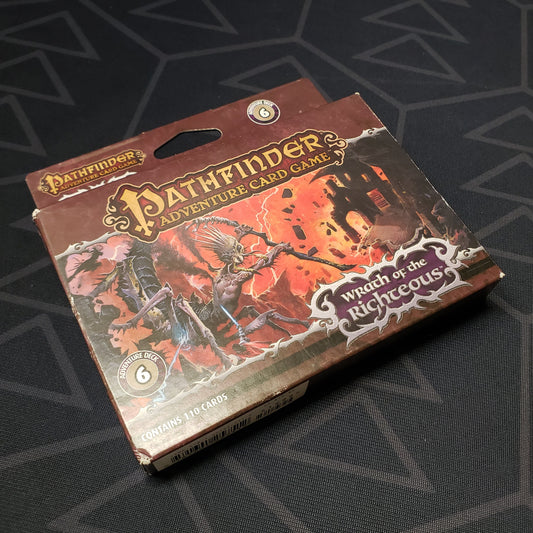 Image shows the front of the box of the Wrath of the Righteous: Adventure Deck 6 - City of Locusts for the Pathfinder Adventure Card Game