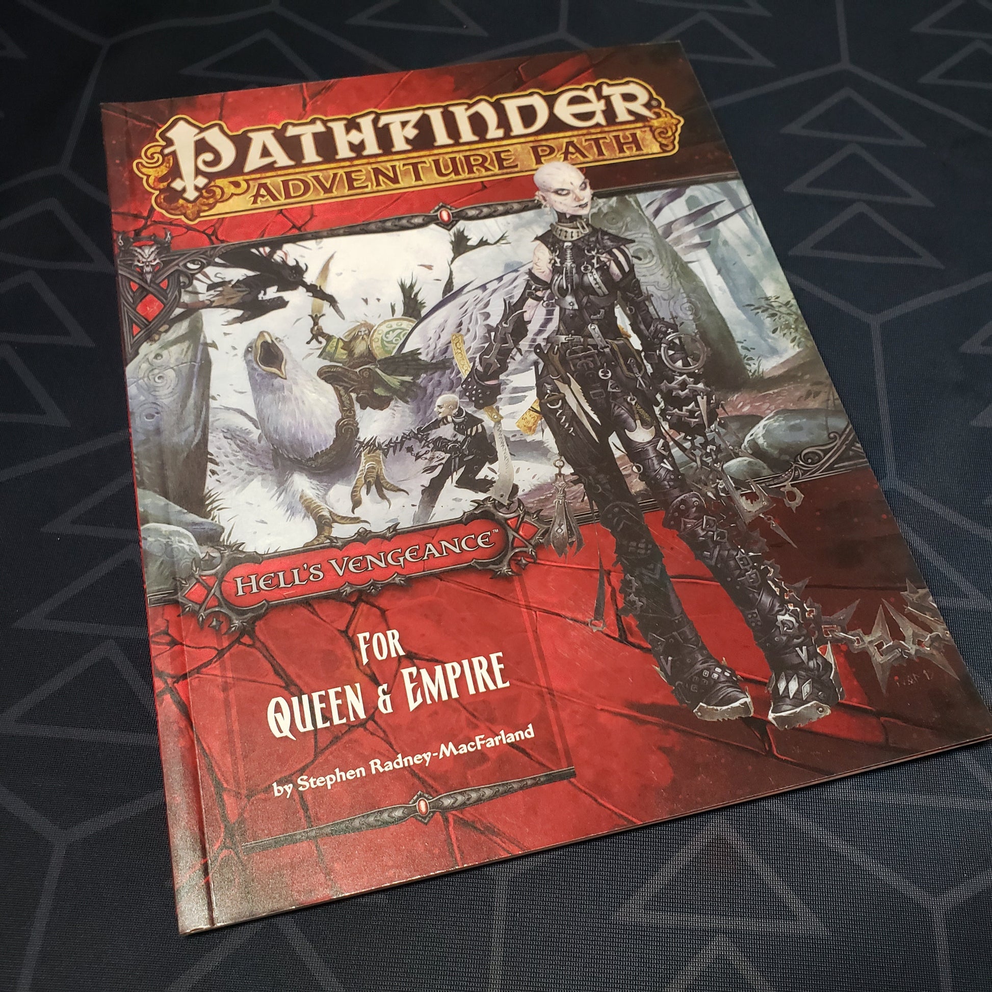 Image shows the front cover of the For Queen & Empire book for the roleplaying game Pathfinder: First Edition