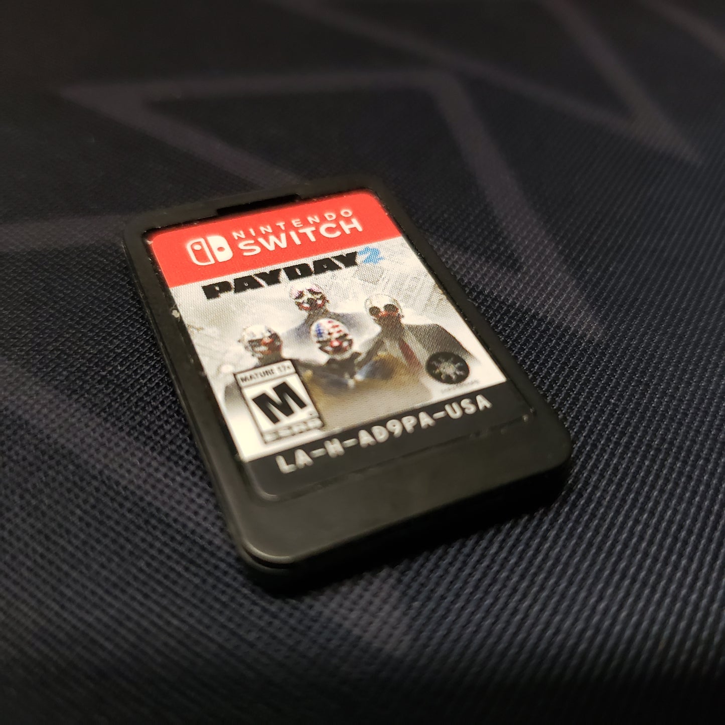 Image shows the cartridge for the game Payday 2 for Nintendo Switch