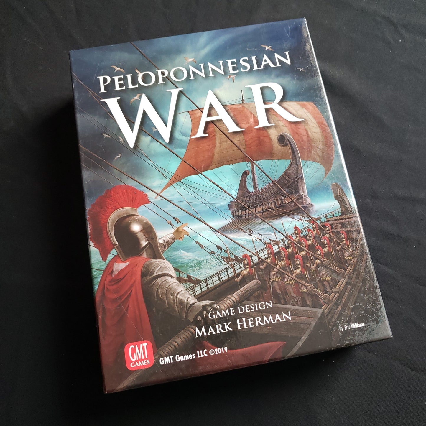 Image shows the front cover of the box of the Peloponnesian War board game