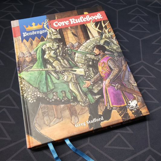 Image shows the front cover of the core rulebook for the roleplaying game Pendragon