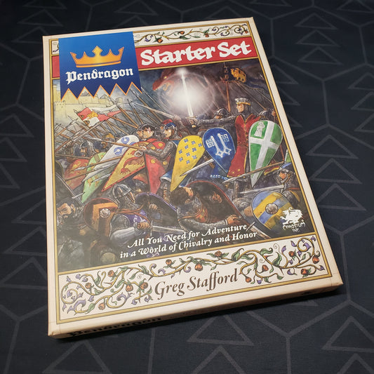 Image shows the front cover of the starter set box for the roleplaying game Pendragon