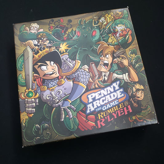 Image shows the front cover of the box of the board game Penny Arcade: Rumble in R'lyeh